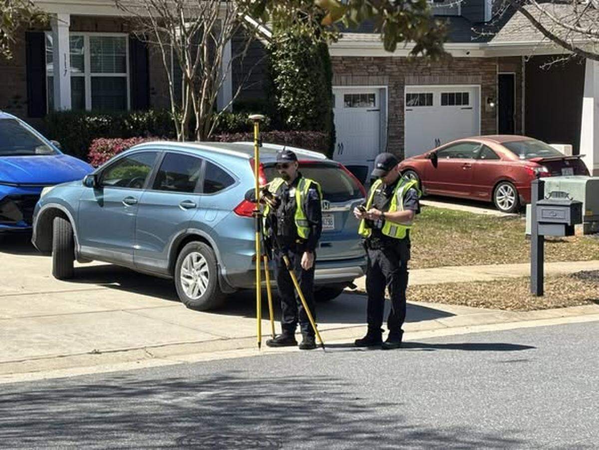 A crash reconstruction team from the Mooresville Police Department was at the scene of a fatal golf car wreck Tuesday afternoon.