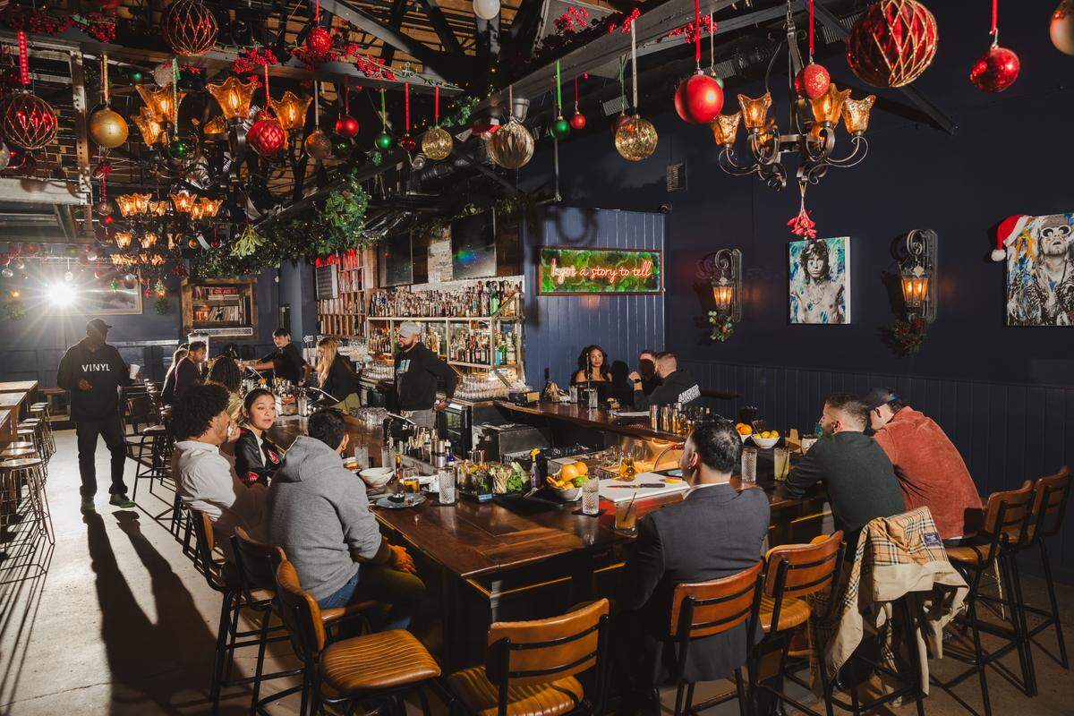 At VINYL, you can grab a holiday cocktail and pair it with Scotch Deviled Eggs or a charcuterie board.