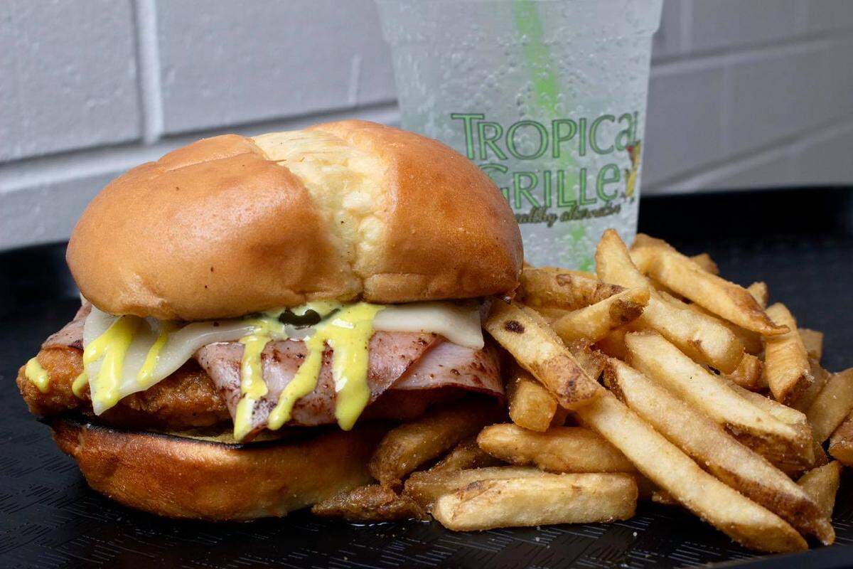 The menu at Tropical Grille, which is relocating in Charlotte, includes Cuban classics like Palomilla and pan con lechon, a popular Cuban sandwich.