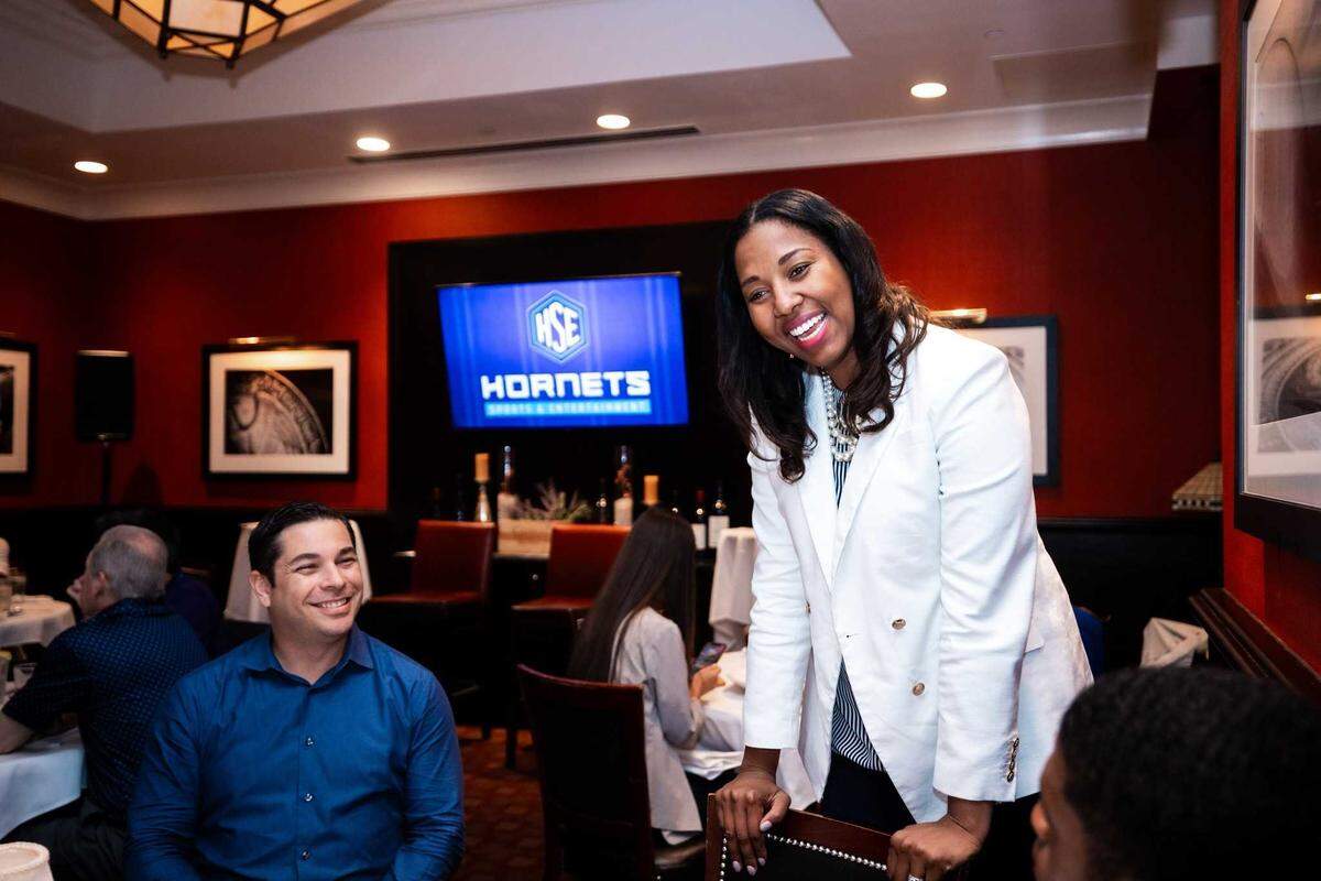 Charlotte Hornets team president Shelly Cayette-Weston speaks to the media at an introductory luncheon.