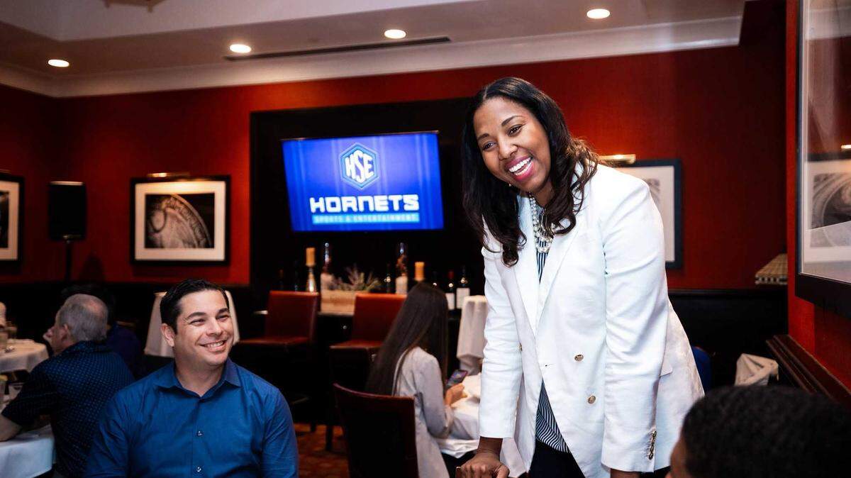 Charlotte Hornets team president Shelly Cayette-Weston speaks to the media at an introductory luncheon.