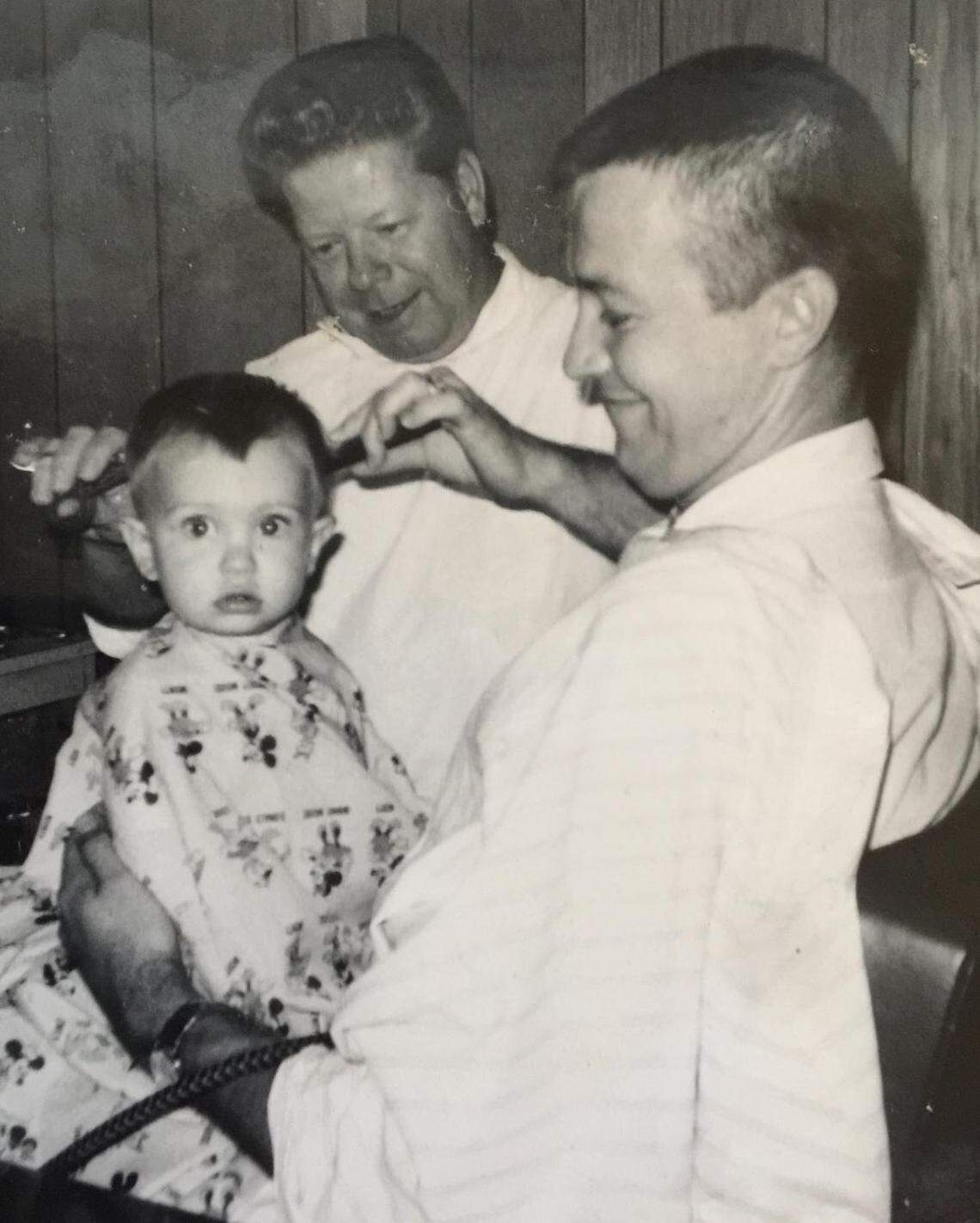 In 1965, Scott Fowler got his first haircut while being held by his father, Steve Fowler. The family lived in Texas at the time and would move to Spartanburg, S.C., in 1973.