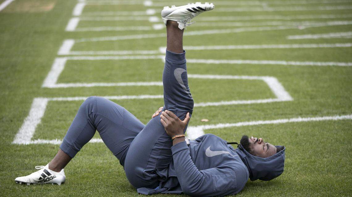 Andre Smith, the Panthers’ seventh-round pick, stretches during North Carolina’s pro day last month. Smith participated in drills at the pro day after injuring his hamstring running the 40-yard dash at the NFL scouting combine. Hamstring injuries can require surgery, depending on the severity of the injury.