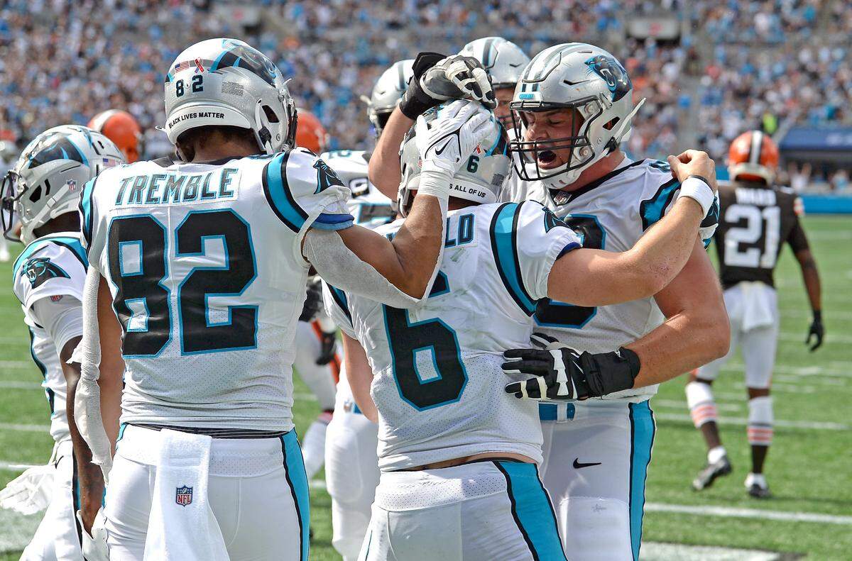 Carolina Panthers quarterback Baker Mayfield is congratulated by his teammates following his rushing touchdown during fourth quarter action against the Cleveland Browns at Bank of America Stadium on Sunday, September 11, 2022. The Browns defeated the Panthers 26-24.
