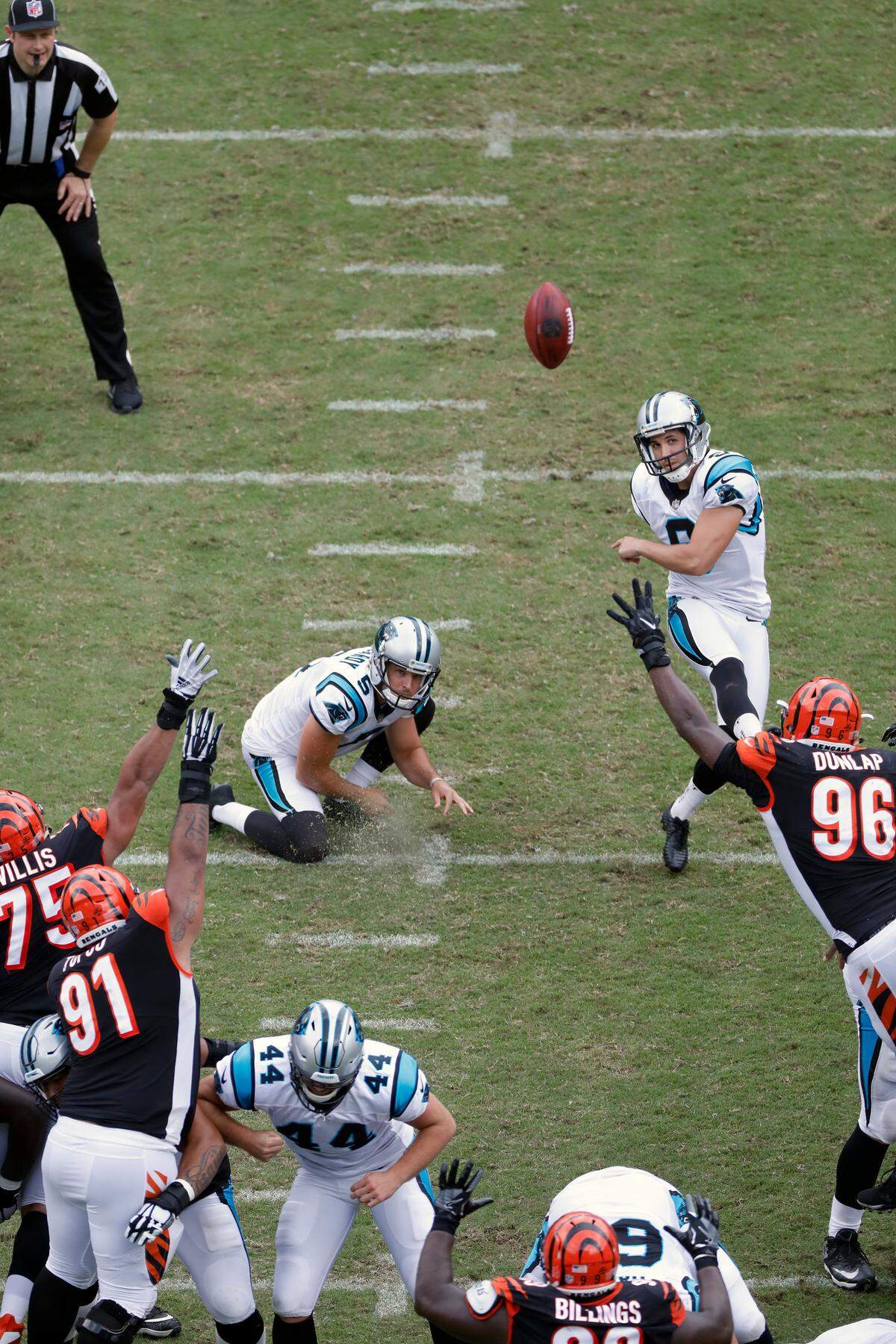 Carolina Panthers placekicker Graham Gano (9) puts the Panthers up by 10 as Michael Palardy (5) holds during the second half of an NFL football game against the Cincinnati Bengals in Charlotte, N.C., Sunday, Sept. 23, 2018. The Panthers won 31-21.