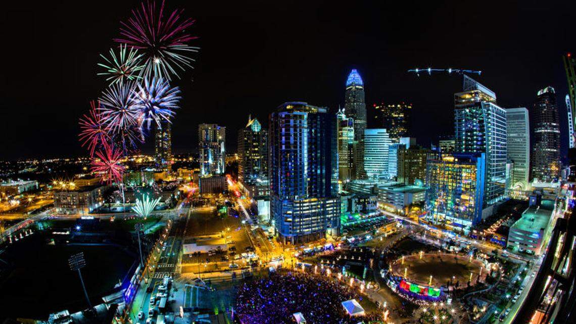 Fireworks explode against the backdrop of the Charlotte skyline, as thousands of people gathered at Romare Bearden Park on New Year’s Eve to ring in 2017. The uptown event returns on Dec. 31, 2021.