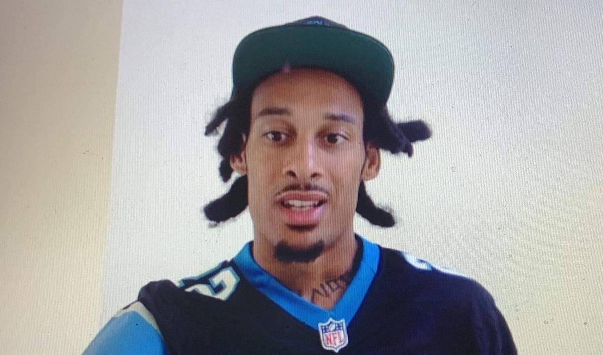 New Carolina Panthers wide receiver Robby Anderson wore a Christian McCaffrey jersey during an introductory video teleconference session with Charlotte-area reporters in April.