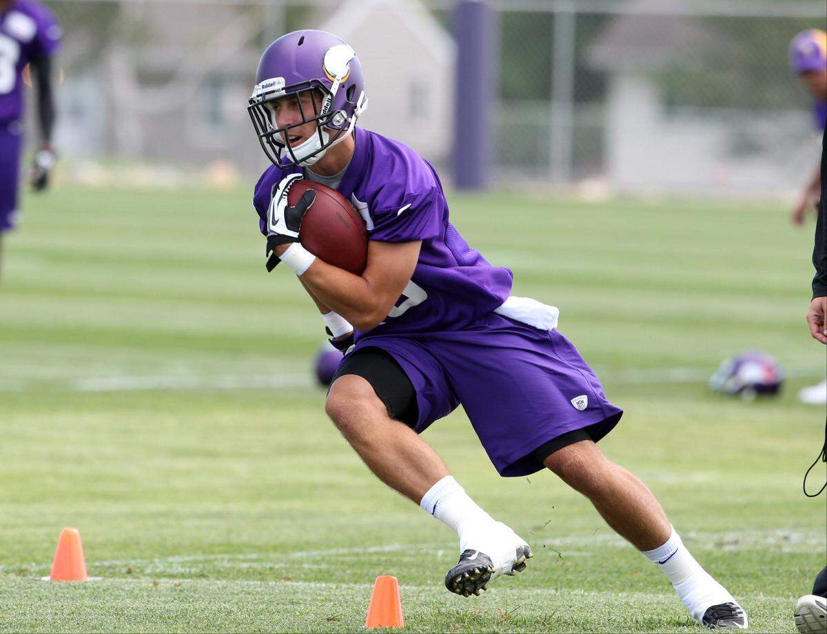 Then-Minnesota Vikings wide receiver Adam Thielen (19) practices during 2013 training camp at Minnesota State University. 