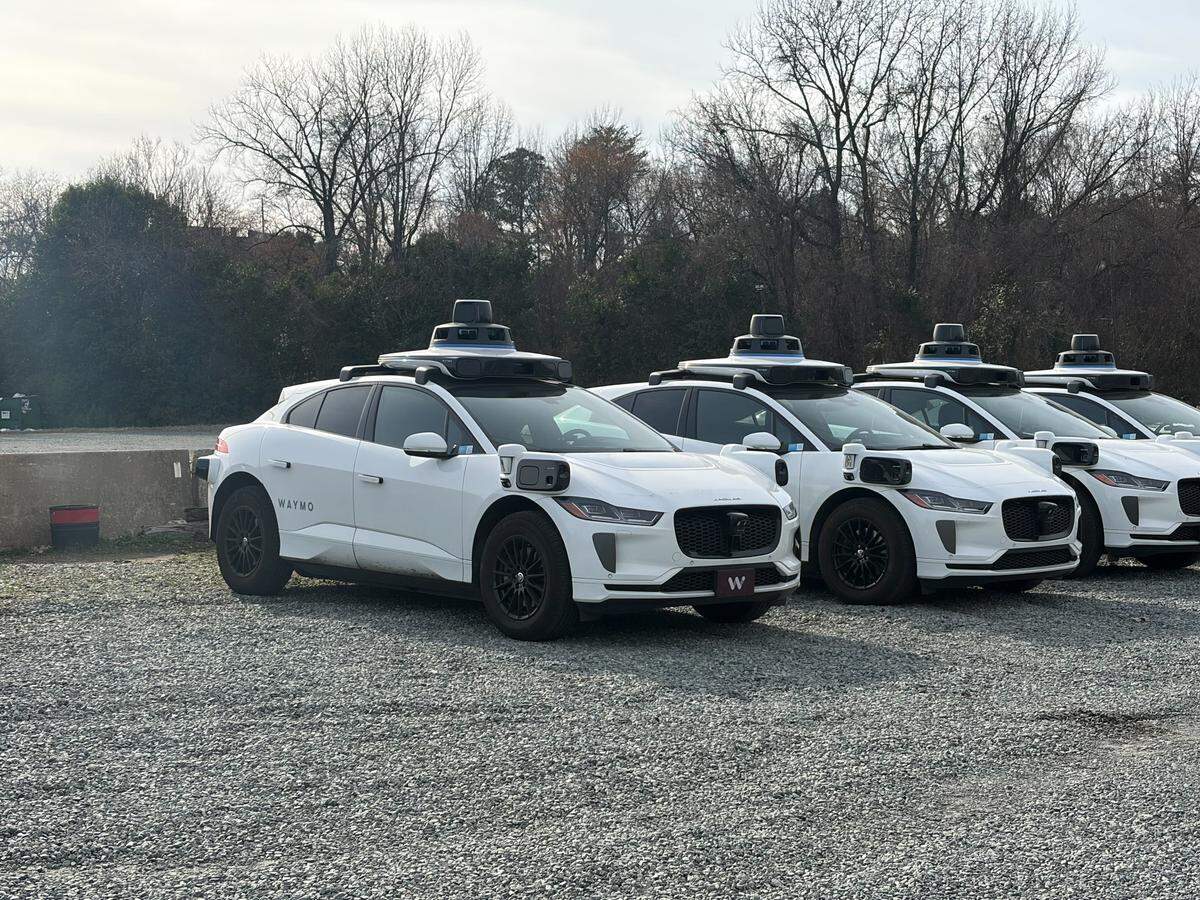Driverlesss Waymo cars were seen at this gravel lot in uptown Charlotte Tuesday.