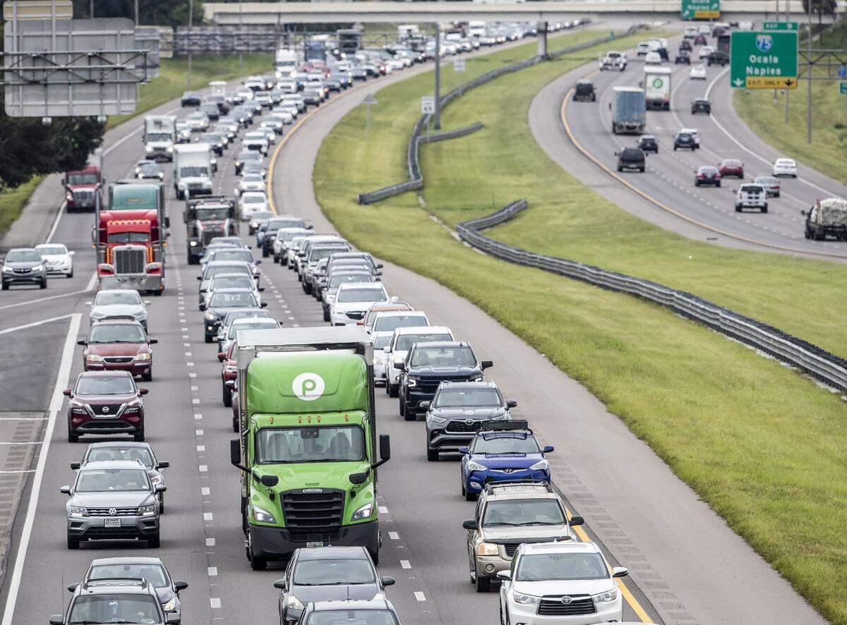 Vehicles fill the lanes on Interstate 4 in the Tampa, Florida, area as residents and motorists escape the approaching high winds and flood waters of Hurricane Ian on Tuesday, Sept. 27, 2022.