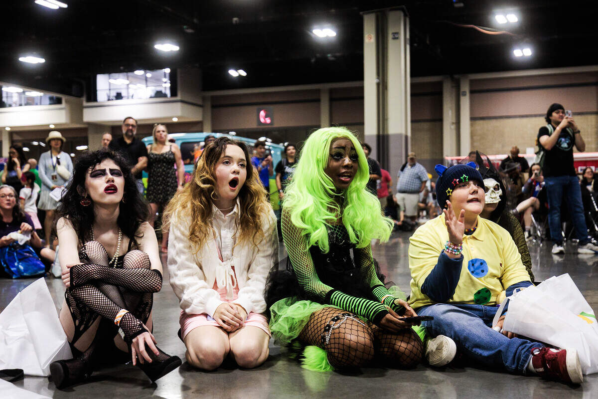 From left: Lily Reavis-Goodson (17), Kennedy Armstrong (17), Jaxx Dunwoody and Sawyer Bolton (12) react to the Heroes Convention cosplay contest on Friday, June 12, 2026 at the Charlotte Convention Center. The group dressed as Frank-N-Furter and Janet Weiss from “The Rocky Horror Picture Show,” GIR from “Invader Zim” and Pete the Cat from “Pete the Cat,” respectively.