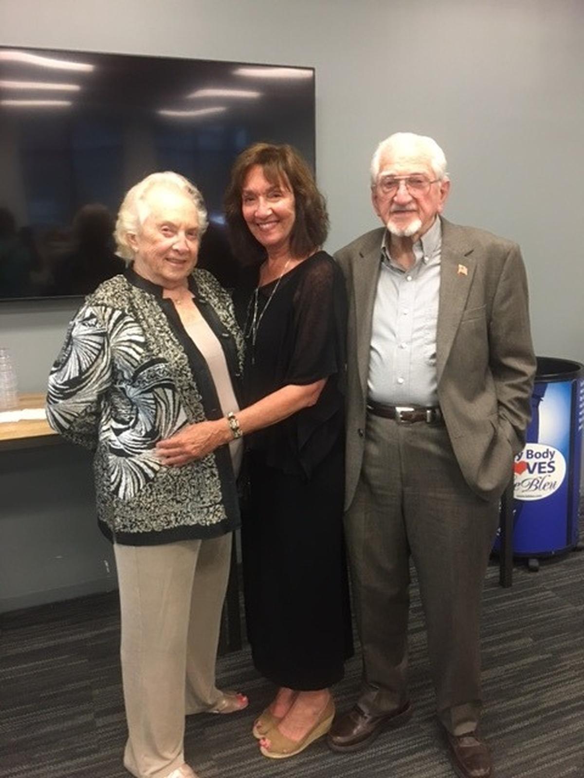 Deborah Goodman, center, with her parents Carole and Arthur Heisler.
