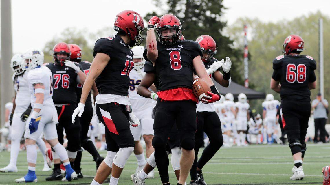 Davidson running back Bradyn Oakley celebrates during the Wildcats’ win over Morehead State in March. Davidson won the Pioneer Football League for the first time ever this season.