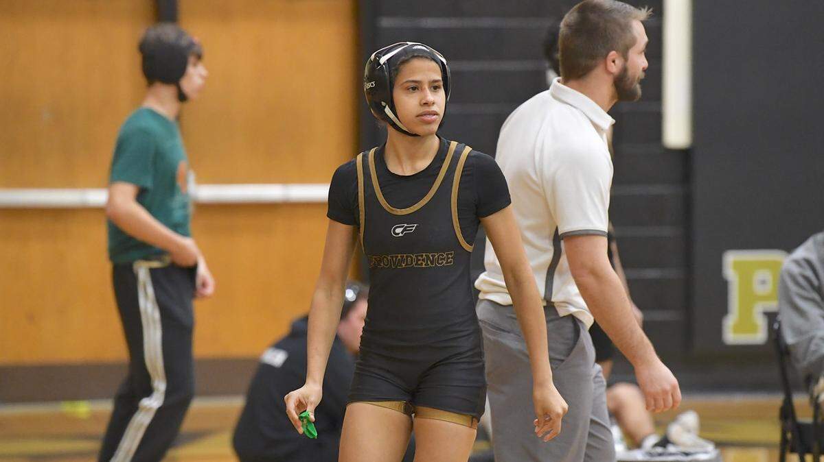 Providence High female wrestling star Nikoly dos Santos recently won the SoMeck conference tournament, wrestling against boys. She’ll compete in the first NCHSAA state girls tournament Saturday as a No. 1 seed