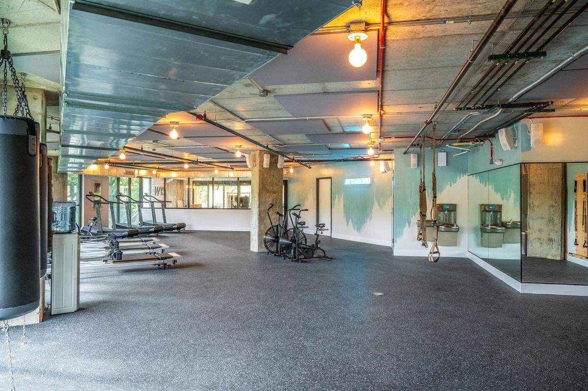 The new space will feature ample room to work out as well as murals by Elizabeth Rose.