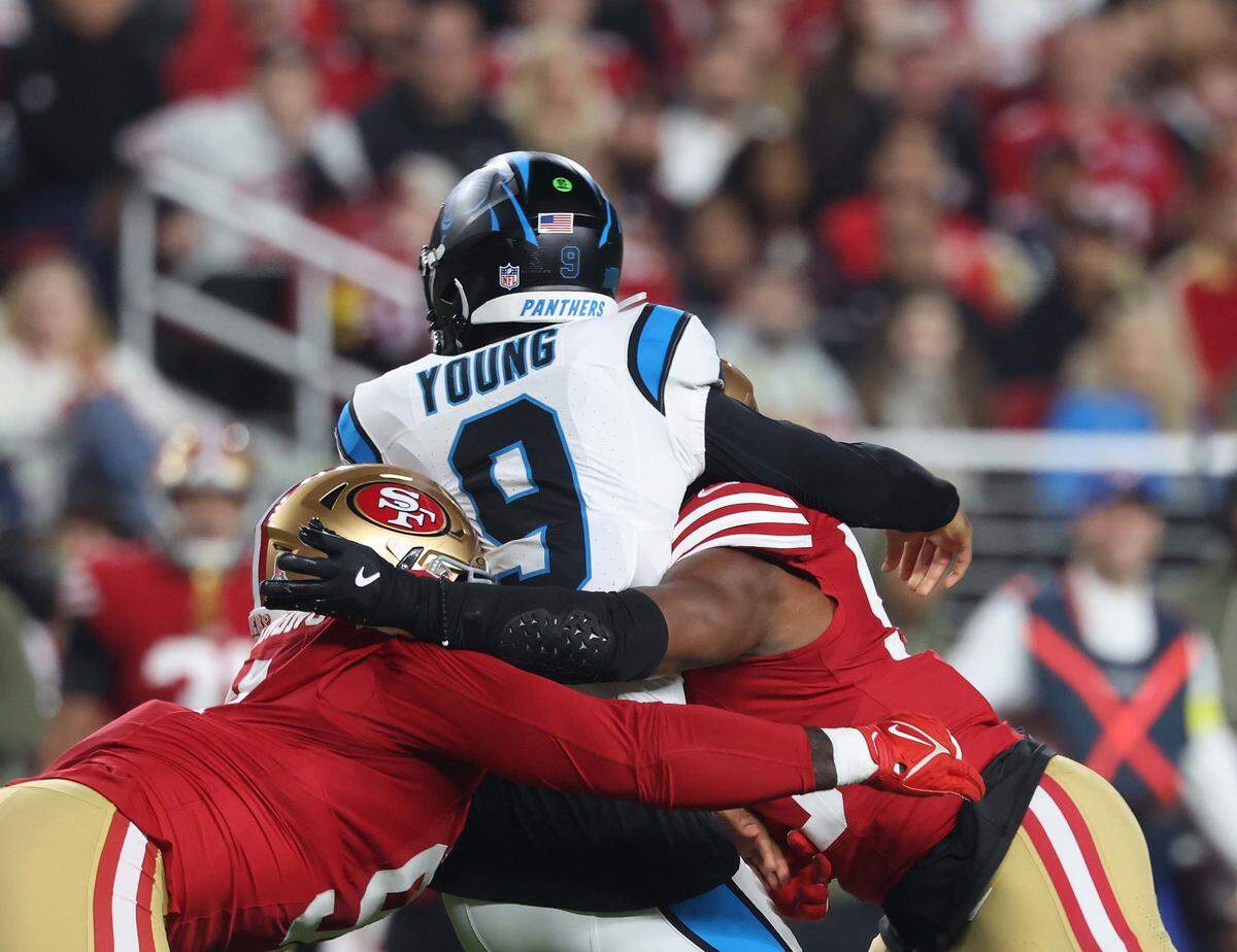 Carolina Panthers quarterback Bryce Young is pressured while making a pass by the San Francisco 49ers in Monday’s first quarter at Levi’s Stadium.