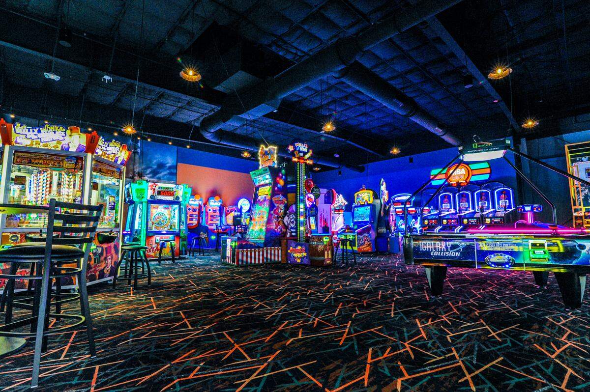 A section of the game room at the Spare Time Entertainment in Greenville, S.C., is similar to what the 10,000-square-foot arcade with over 80 games and a prize store will look like when the Pineville venue opens.