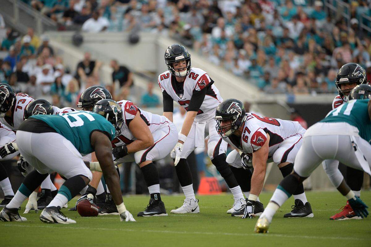 Atlanta quarterback Matt Ryan (2) didn't live up to his 2016 MVP-caliber form last season, but with more weapons at his disposal this year, he'll be difficult for Carolina to contain.