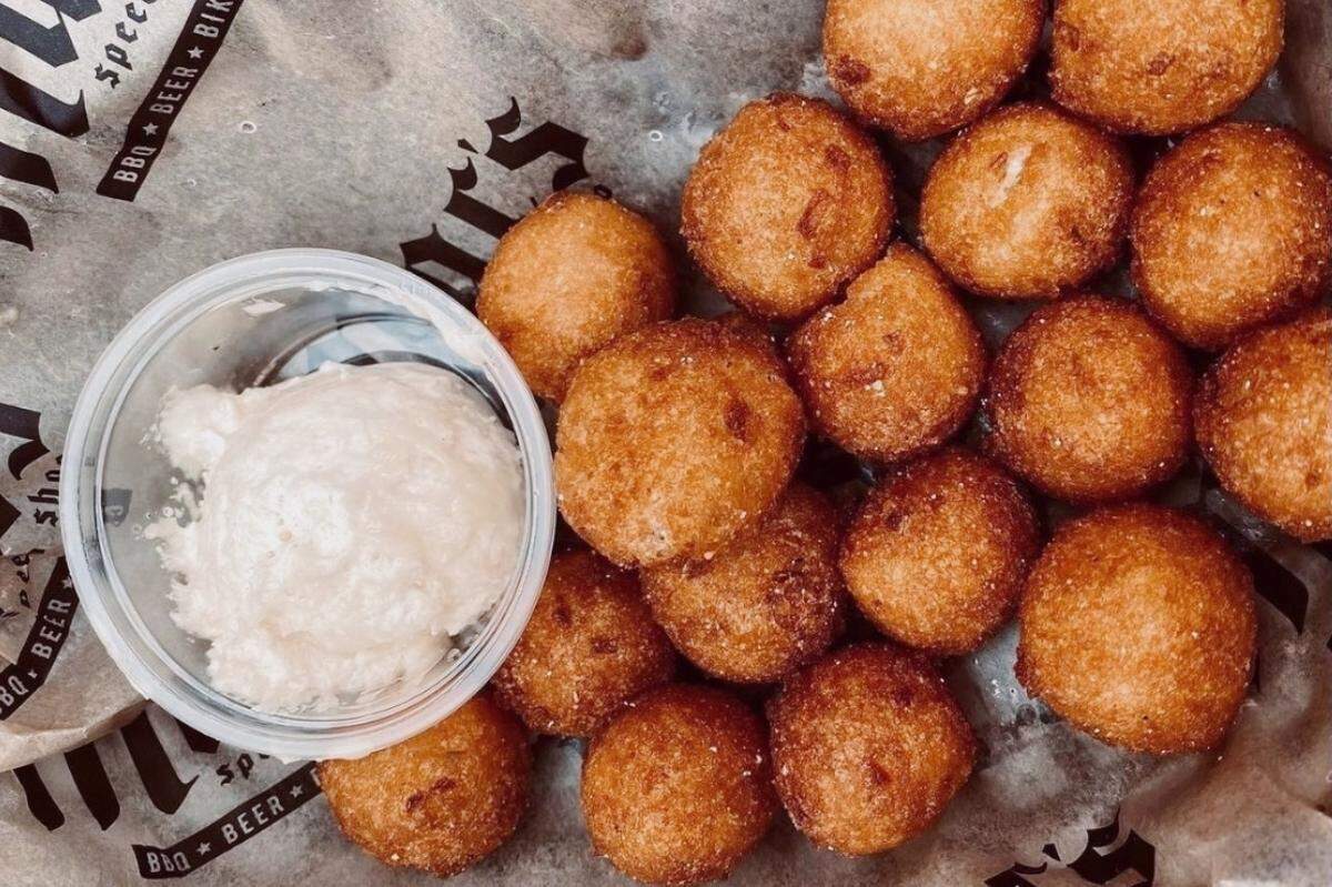 All Mac’s Speed Shops will charge $1 for unlimited hushpuppies for two with the purchase of a meal.