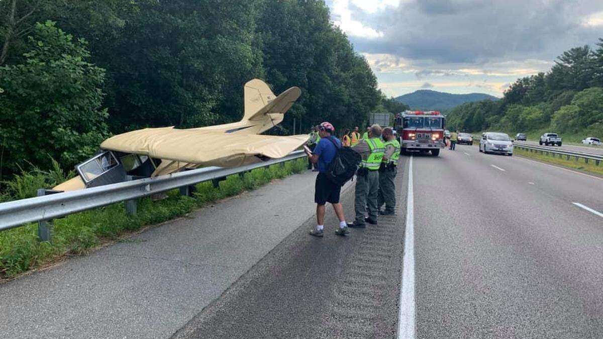 A small airplane in distress landed on Interstate 40 near Nebo in McDowell County, North Carolina, on Saturday, Aug. 22, 2020, emergency management officials said.