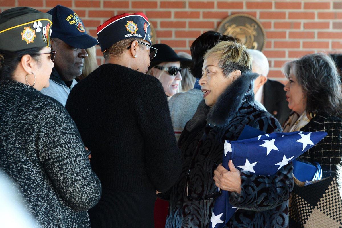 Brenda Brewer, right, greets well-wishers after the ceremony honoring her cousin Fred L. Brewer, Jr. at Salisbury National Cemetery Annex on Wednesday, Dec. 6, 2023. A World War II pilot who went missing in action is returning home to Charlotte — nearly 80 years later. 
