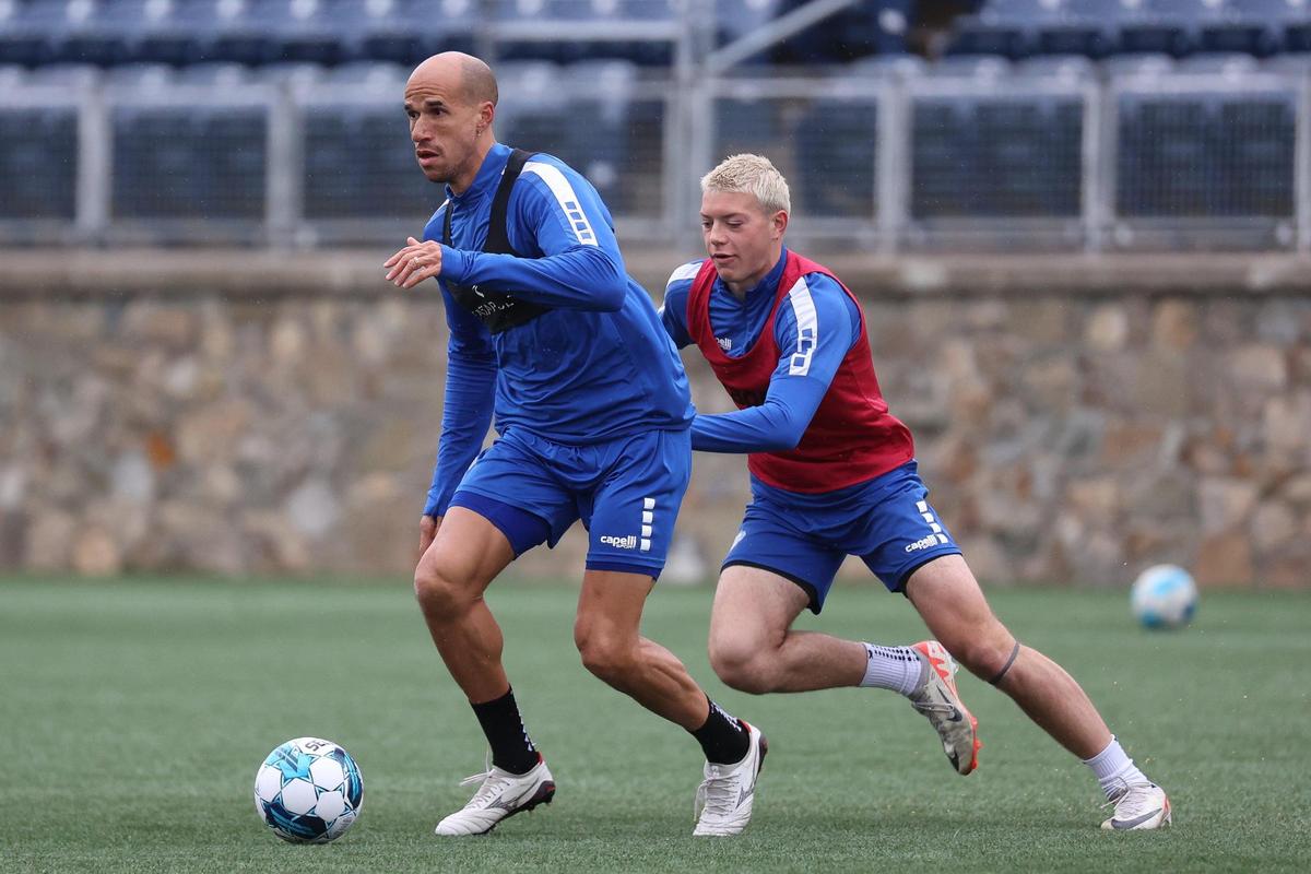 CHARLOTTE, NC - MARCH 1: Gabriel Obertan (left) of the Charlotte Independence dribbles the ball during a closed practice on March 1, 2024