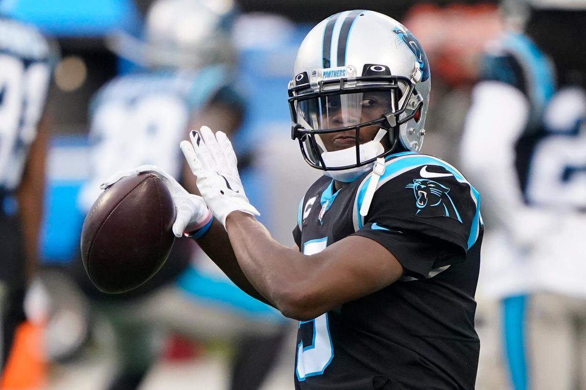 Carolina Panthers quarterback Teddy Bridgewater warms up before an NFL football game against the New Orleans Saints Sunday, Jan. 3, 2021, in Charlotte, N.C. (AP Photo/Brian Blanco)