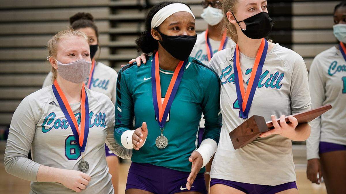 Cox Mill players accept the runner-up trophy at Saturday’s N.C. 3A final