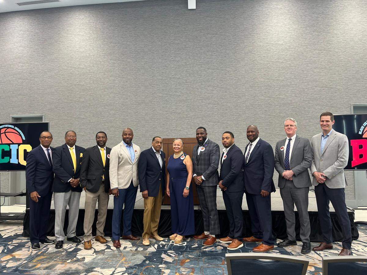 Charlotte Mayor Vi Lyles, center, alongside officials who helped bring the inaugural Black College Invitational Championship to Bojangles Coliseum following a news conference on Aug. 26, 2024.