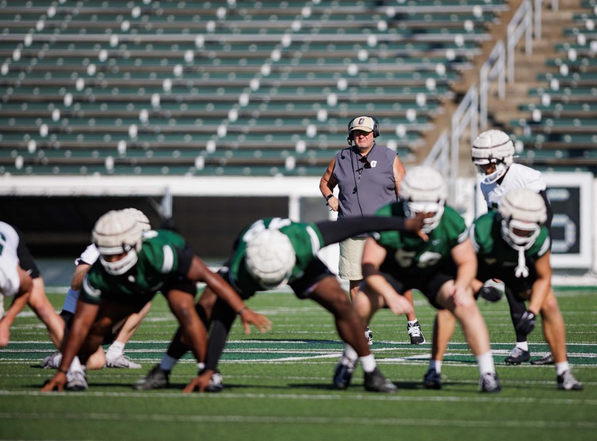 Charlotte 49ers’ head coach Biff Poggi intently looks on as his team would plays in their final intrasquad game at Jerry Richardson Stadium Saturday August 24, 2024.