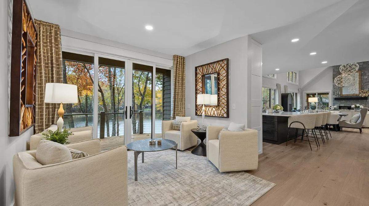 The open floor plan includes “walls of windows with unobstructed water views,” according to the property listing.