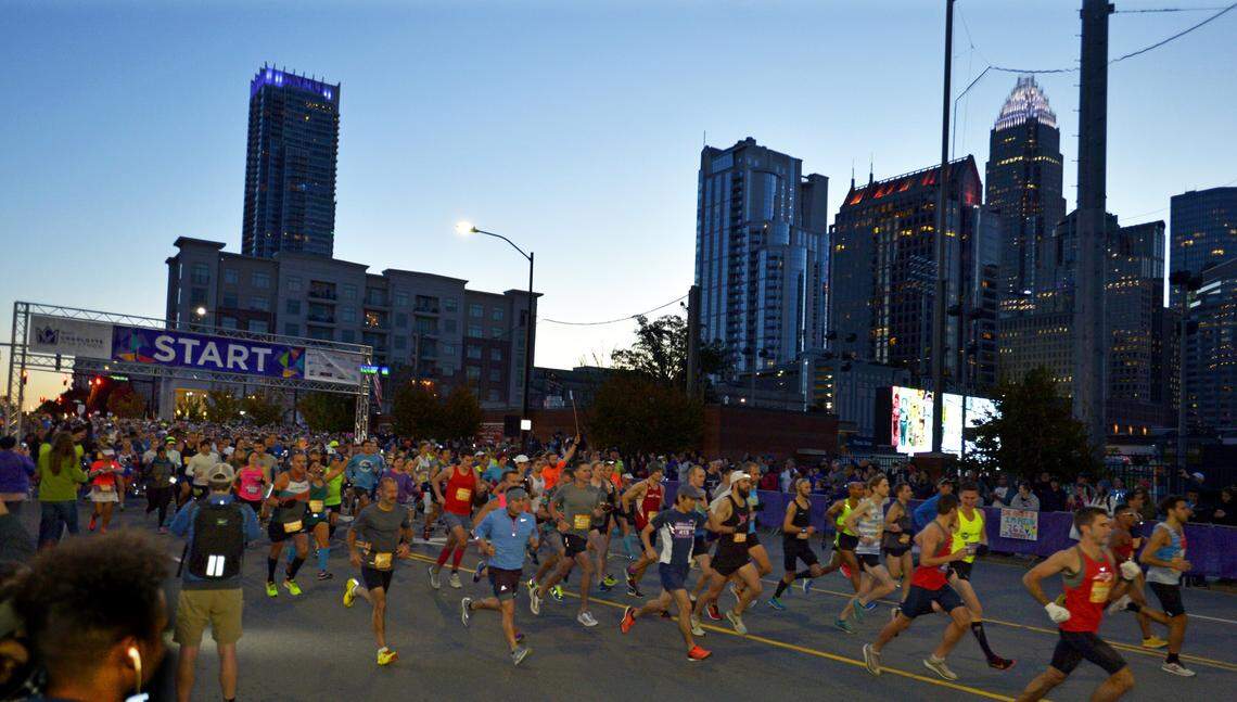 Runners head out from the start of the Charlotte Marathon during the 2018 running of the event.