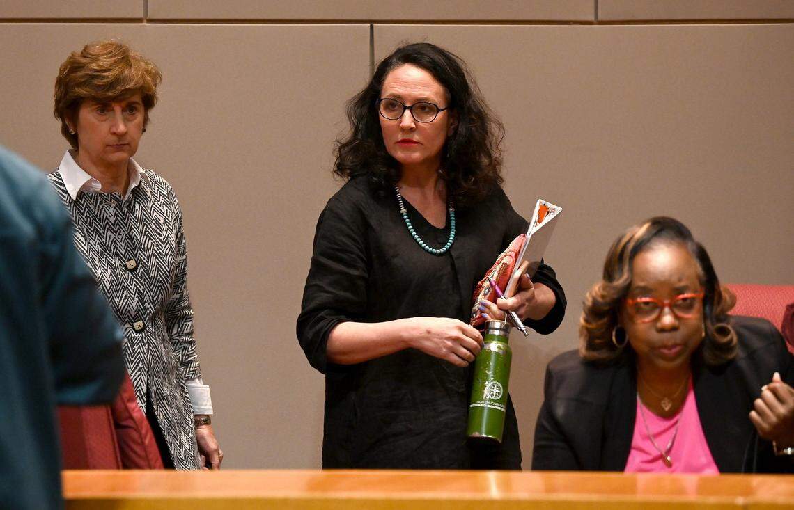 The Charlotte-Mecklenburg Board of Education Elyse Dashew, center, and board members leave for a closed session after 7-2 voted to terminate Superintendent Earnest Winston’s contract on Tuesday, April 19, 2022.