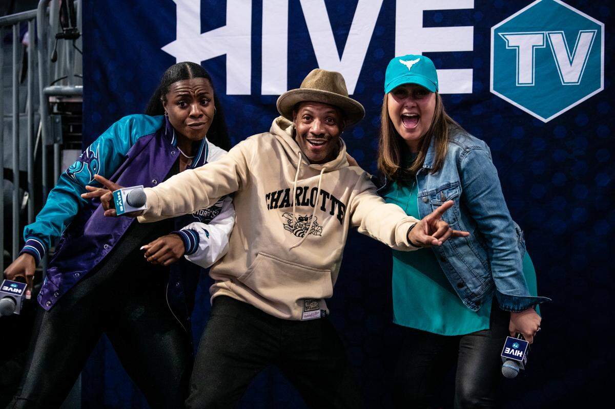 Ohavia Phillips, left, has been criticized for her big personality in the past. But she’s found the perfect place to show it off: for the Charlotte Hornets. She’s pictured here with fellow in-arena co-hosts Fly Ty and Jacinda.