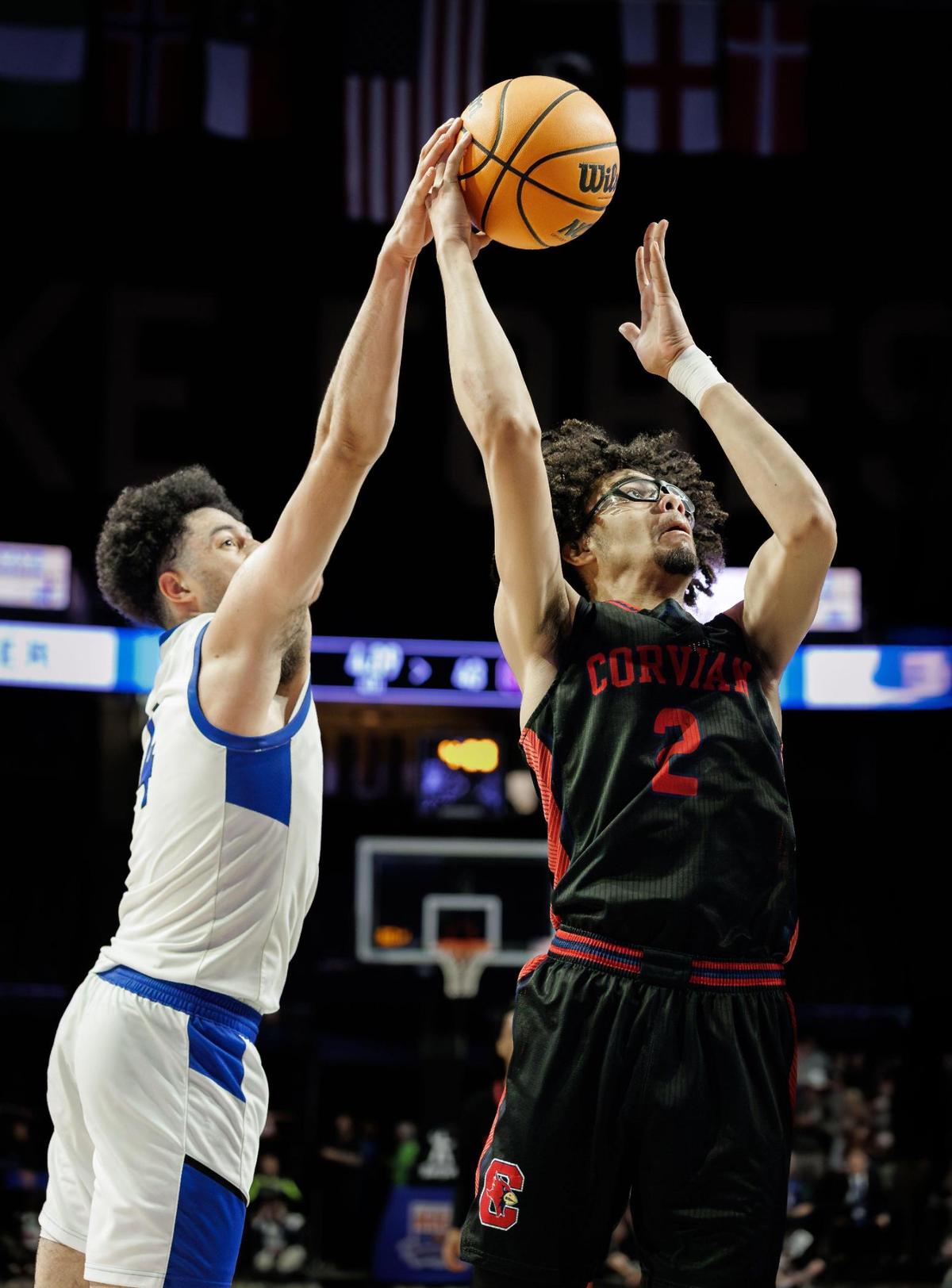 Southern Wake’s Ira Wilson (4) attempts to block the shot of Corvian’s Malachi McCutcheon (2). Corvian would play Southern Wake in the 1A Men’s Basketball NCHSAA Championship Friday 14, 2025.