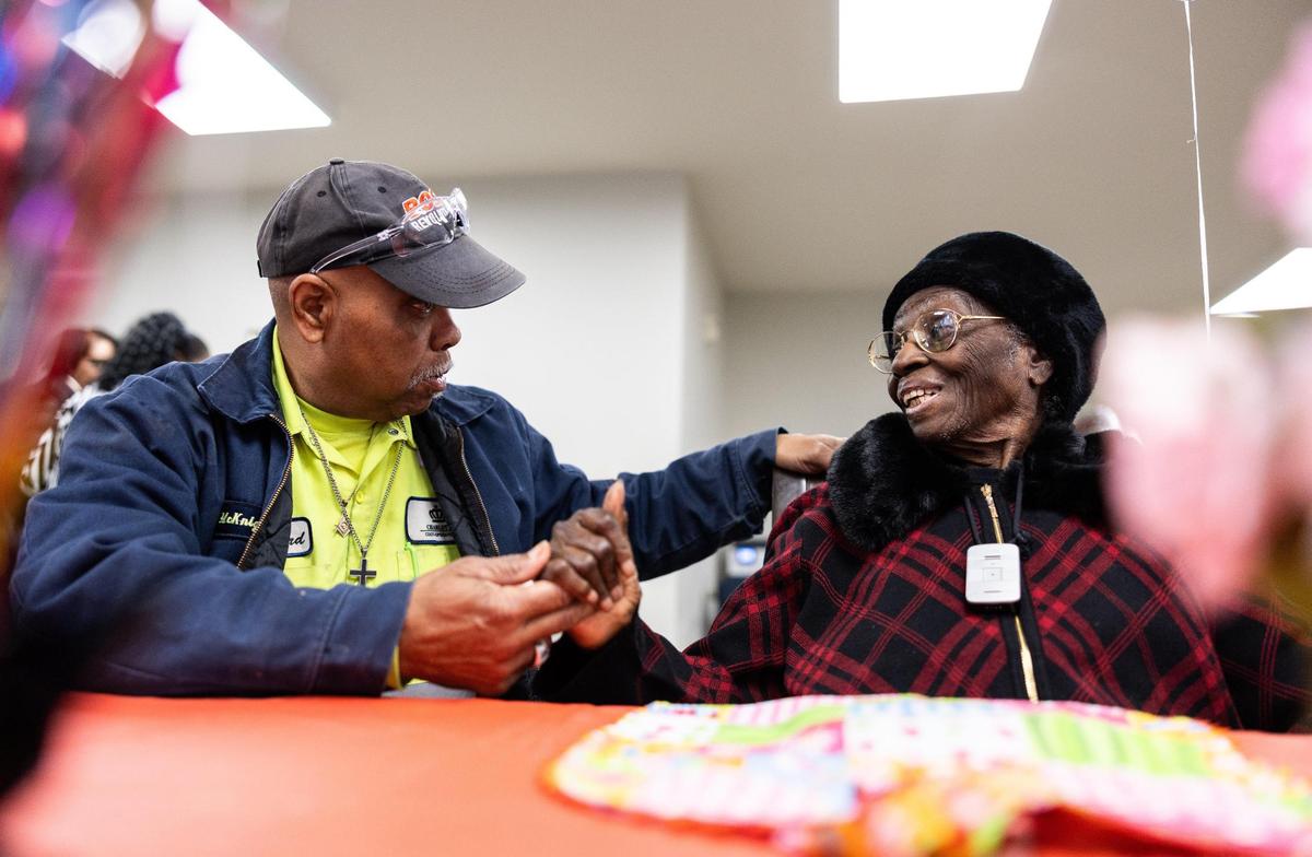 Julia Ann Teamer talks to her nephew, Howard Mcknight, during her 108th birthday at her retirement community in Charlotte, N.C., on Thursday, January 16, 2025.