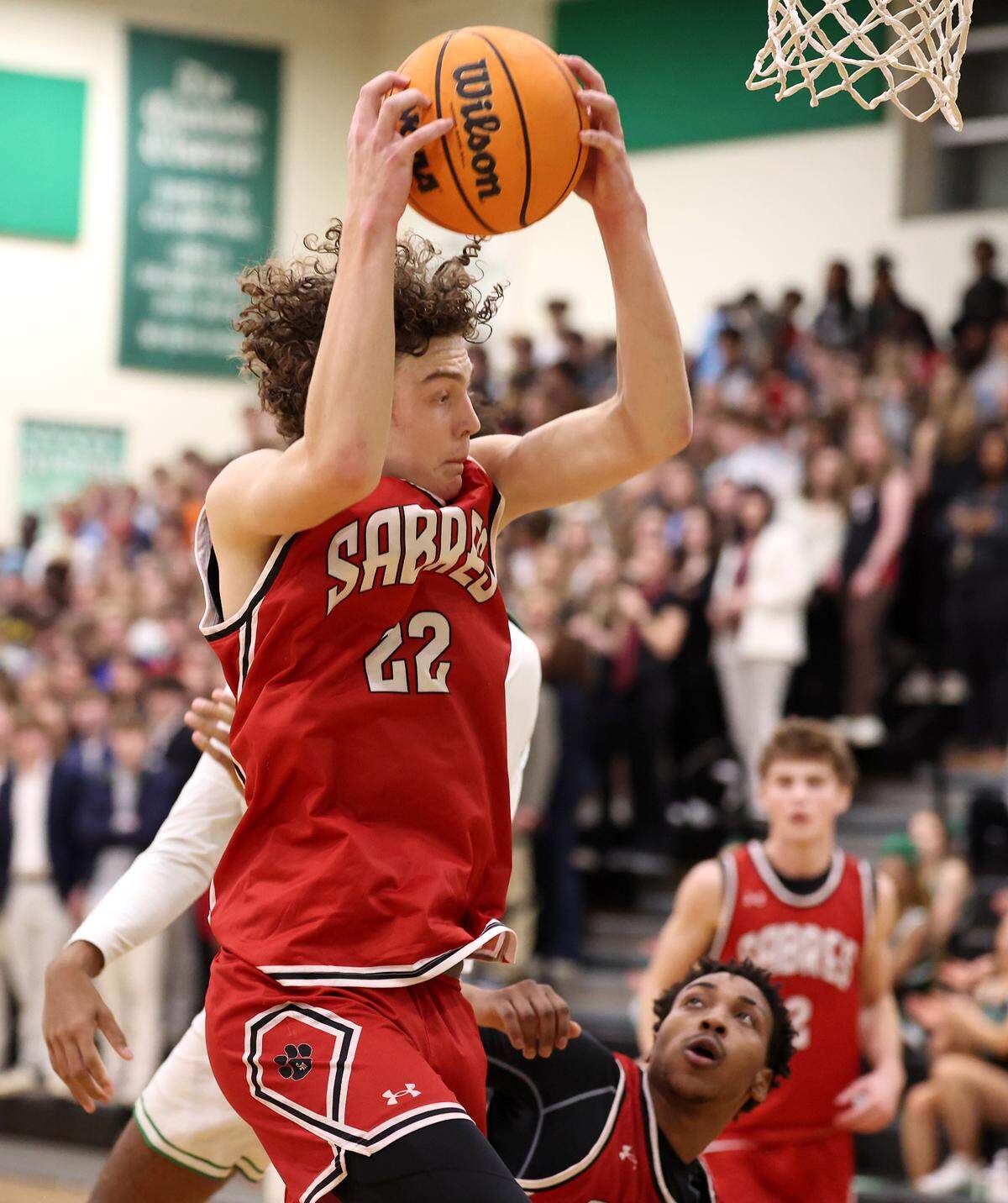 South Meck’s Jim Gatehouse grabs a defensive rebound during action against Myers Park on Friday, January 17, 2025 at Myers Park High in Charlotte, NC. 
