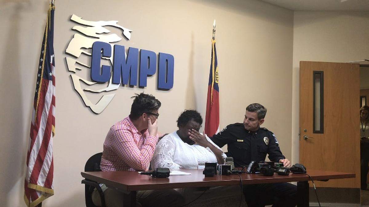 Two Charlotte-Mecklenburg police lieutenants listen to Frenetta Hammonds, whose daughter Shania was found dead in east Charlotte in February 2018.