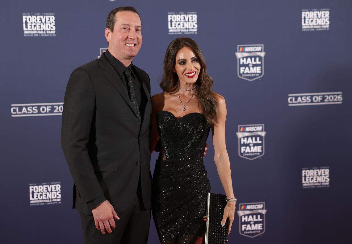 NASCAR driver Kyle Busch and wife, Samantha Busch pose for photographs on the red carpet at the NASCAR Hall of Fame on Friday, January 23, 2026. Kyle Busch’s brother Kurt Busch was enshrined in the Hall of Fame with Harry Gant and Ray Hendrick on Friday.
