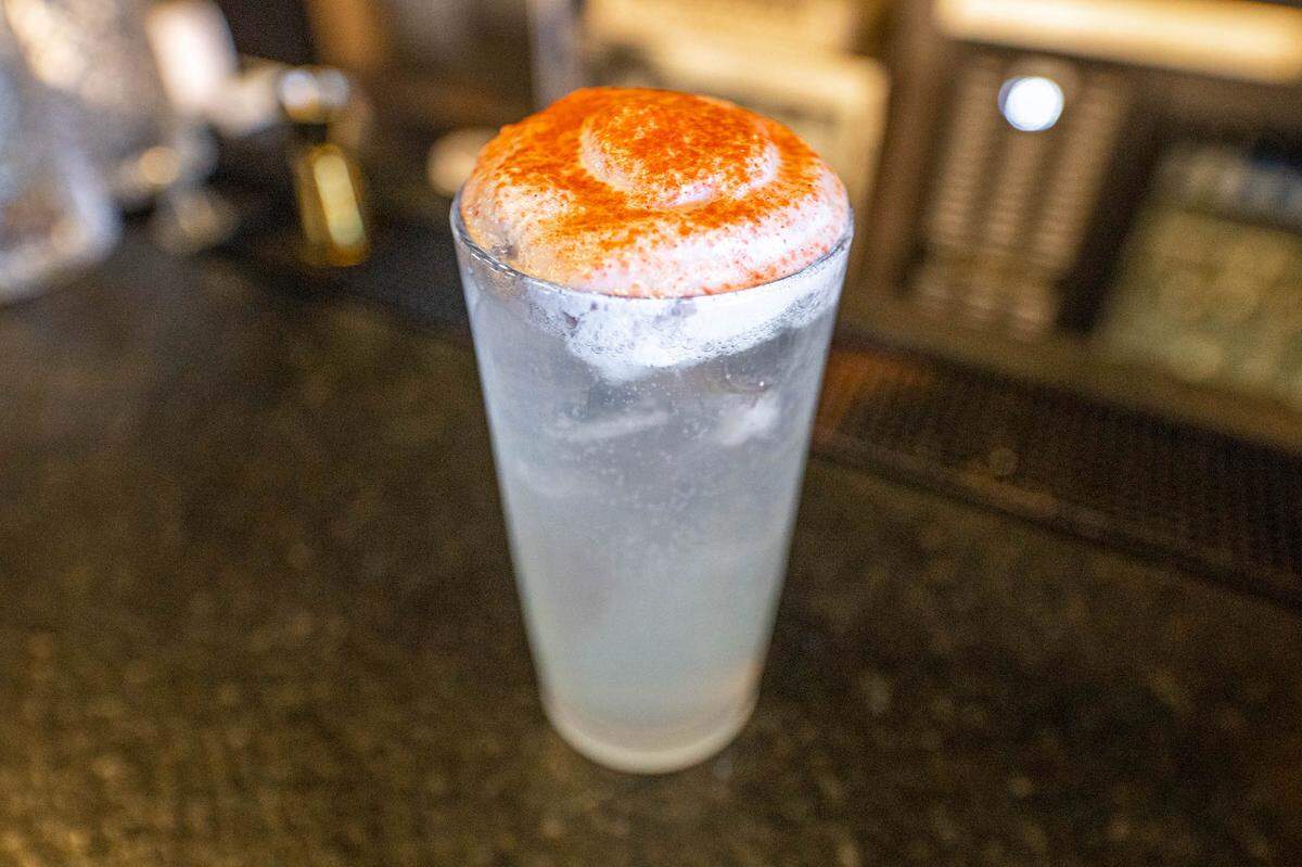 The Berry Nice cocktail at PARA has Grey Goose strawberry & lemongrass essence, lemon, lemongrass, topo chico and strawberry St. Germain foam.