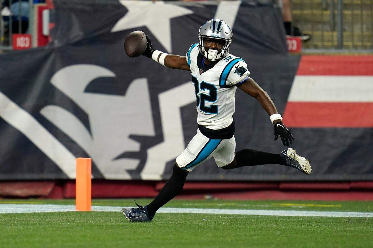 Carolina Panthers cornerback Tae Hayes runs into the end zone for a touchdown after a 50-yard interception return during the second half of the team’s preseason NFL football game against the New England Patriots, Friday, Aug. 19, 2022, in Foxborough, Mass. New England won, 20-10.