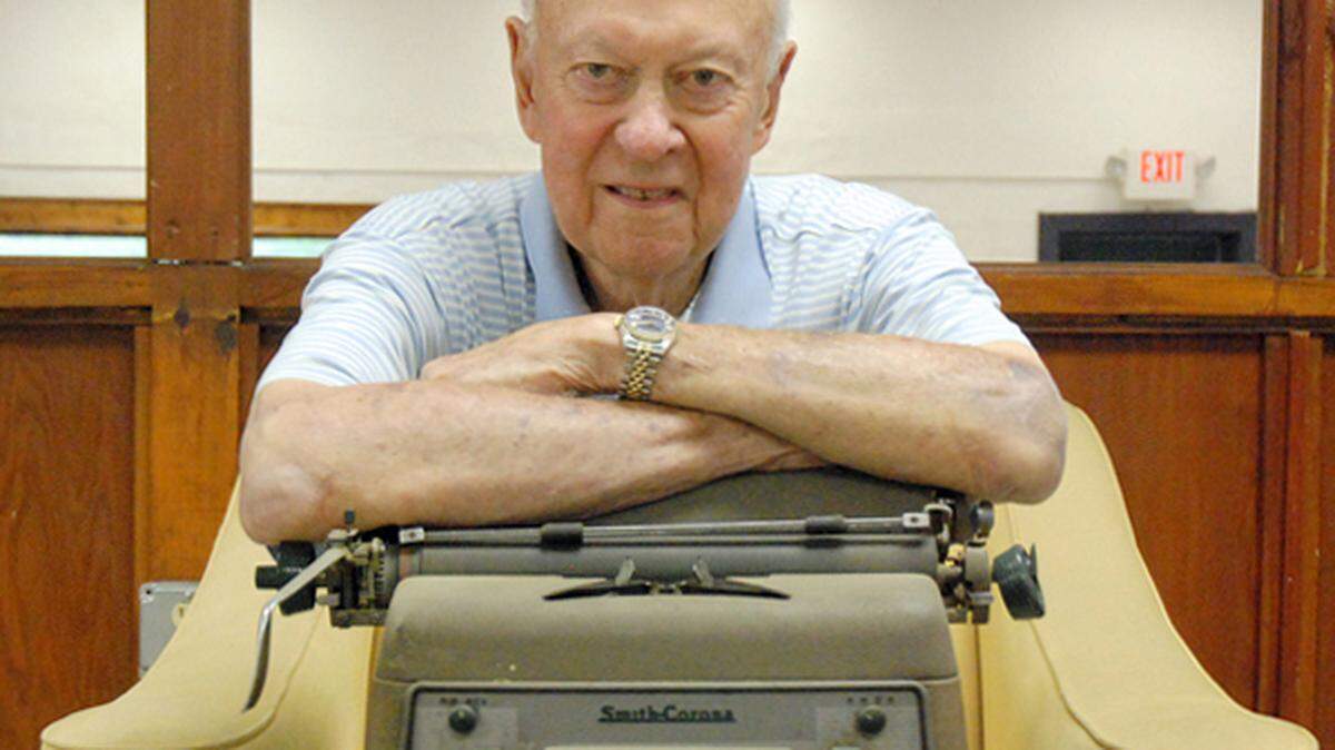 Bill Hensley photographed with his beloved typewriter. It “was his greatest tool,” son Bruce Hensley said.