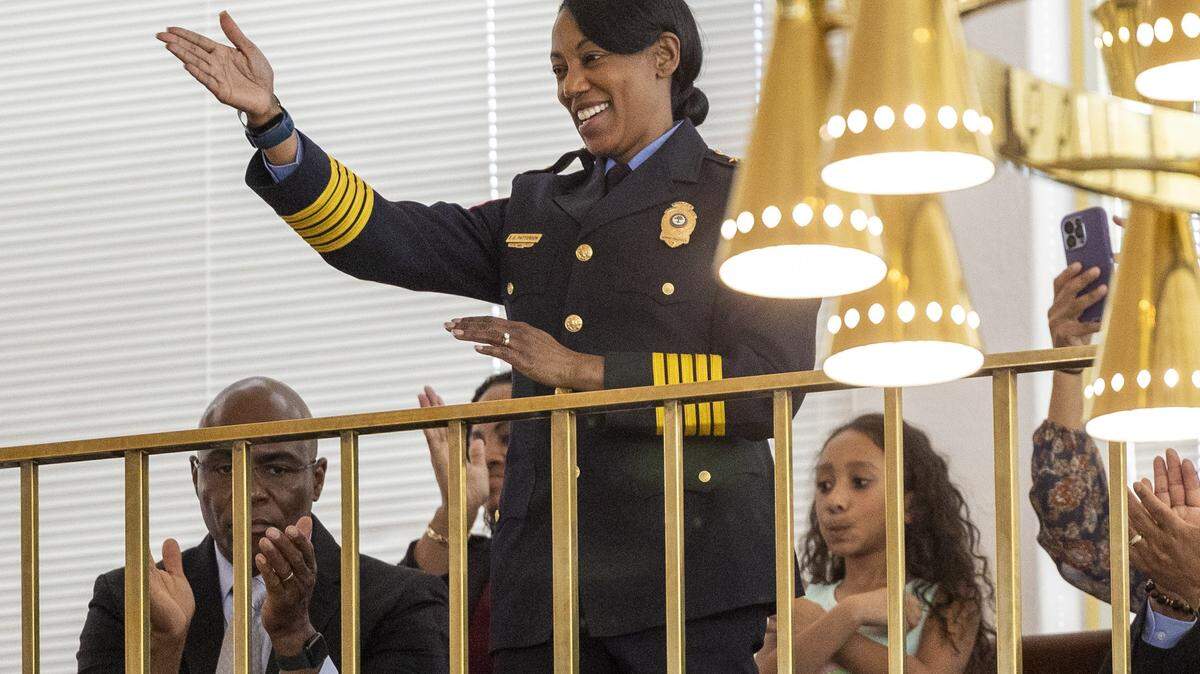 Raleigh Police Chief Estella Patterson waves from the House gallery after being recognized for her service Tuesday, Feb. 25, 2025 at the North Carolina General Assembly.