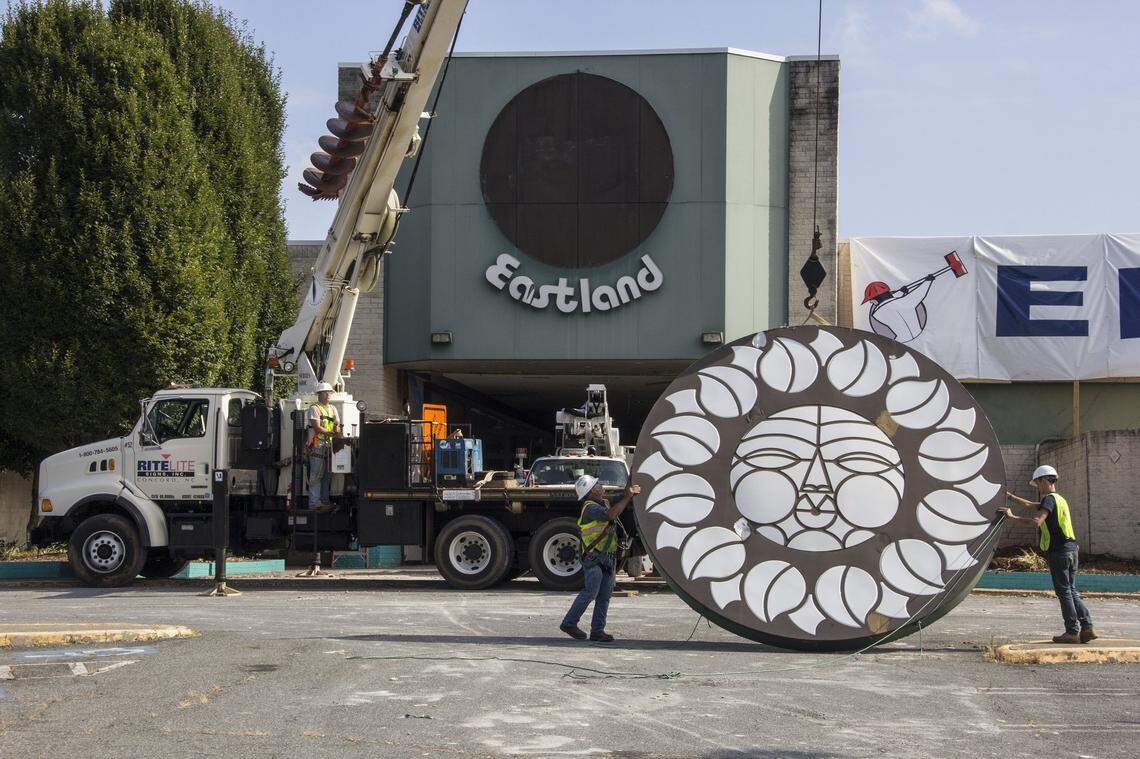 The final “Rising Sun” signage at Eastland Mall being removed and prepared for transport to a storage facility in Concord as it awaits future installation as public art.