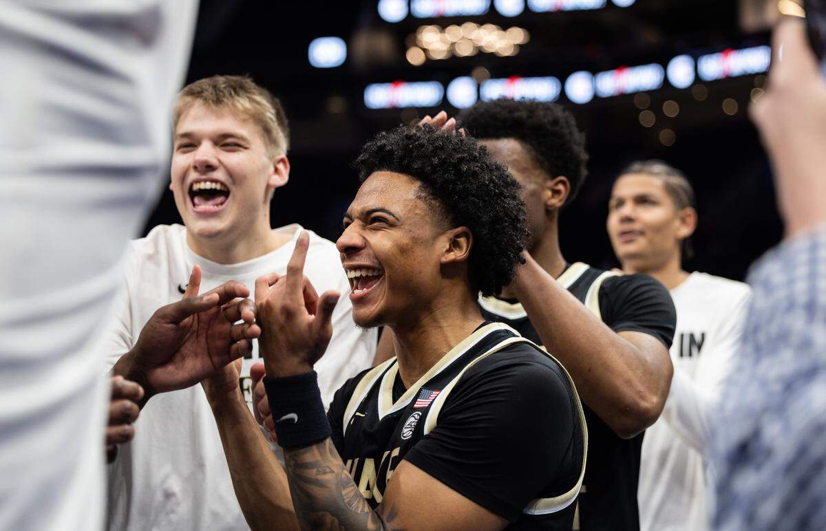 Wake Forest Demon Deacons guard Sebastian Akins celebrates the win against the Virginia Tech Hokies during the ACC men's basketball tournament in Charlotte, N.C., on Tuesday, March 10, 2026. 
