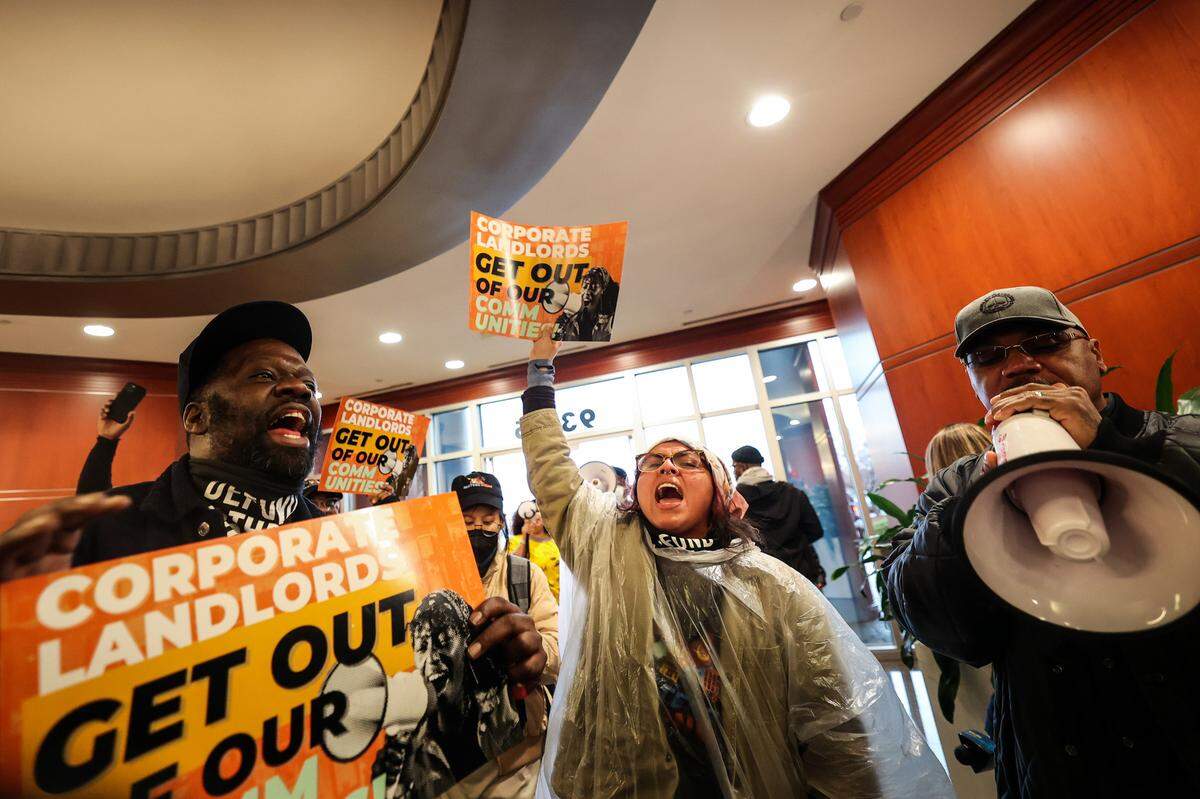 Protestors with Action NC and Renters Rising hold a rally at Invitation Homes’ Charlotte office on Wednesday, January 25, 2023. Invitation Homes is one of the largest national corporate landlords.