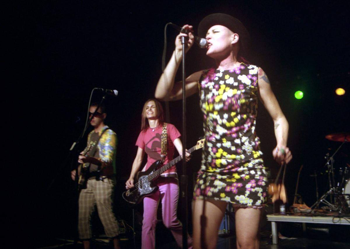 In this 2007 file photo, from left, Aaron Pitkin, Dana Pentes and Hope Nicholls at a Fetchin Bones reunion concert at Amos’ Southend. During its heyday in the 1980s, the Charlotte band released four albums and opened for the Replacements, R.E.M., and the B-52’s.