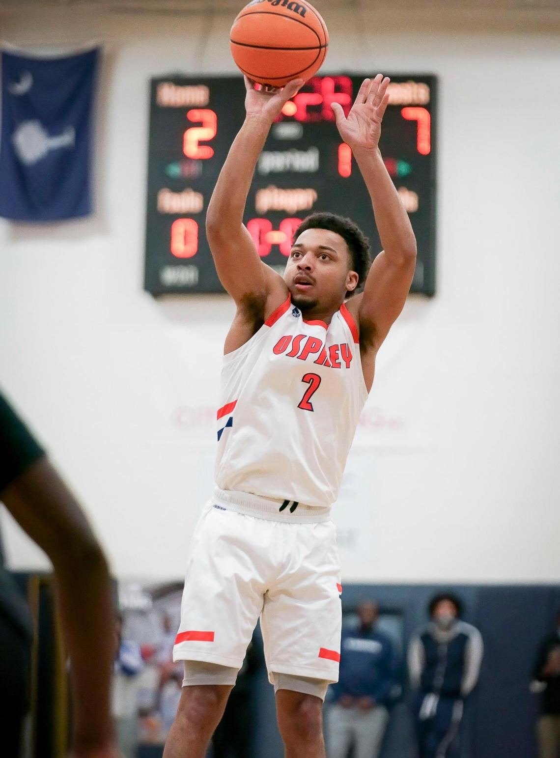 Lake Norman Christian’s Trey Green (1) pulls up and hits the 3-point basket.