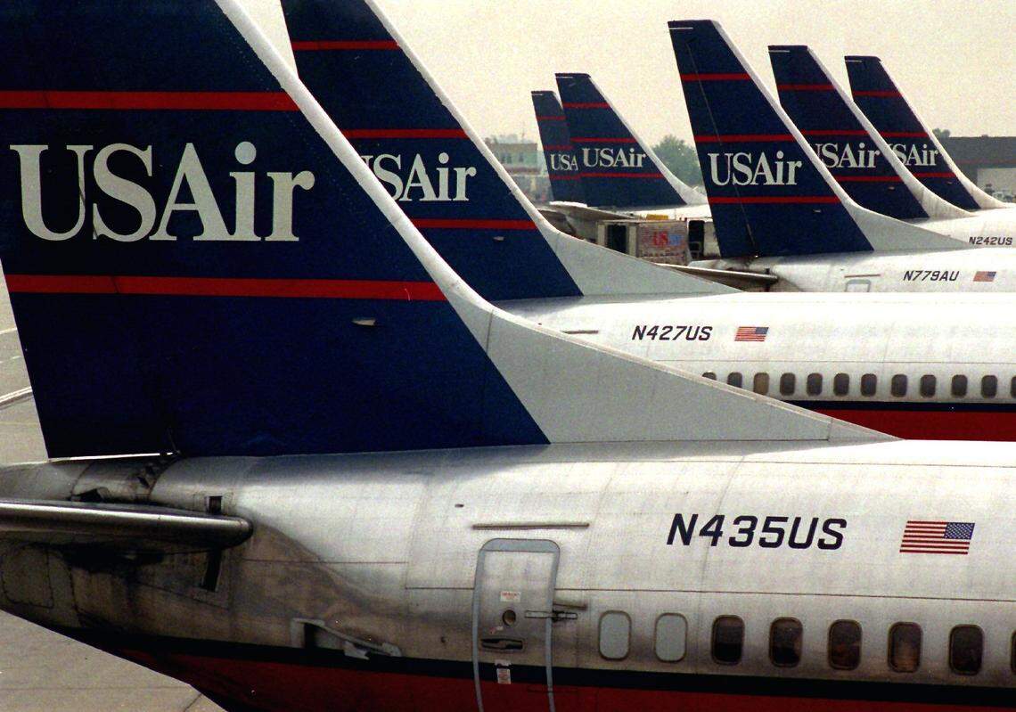 A photo from 1993 shows USAir jets filling nearly all of the gates at Charlotte / Douglas International Airport. 
