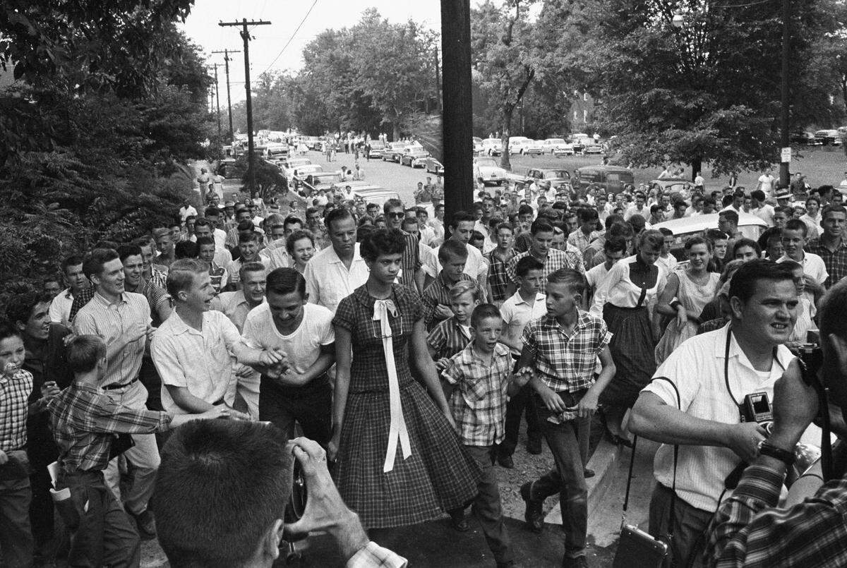 Don Sturkey photographed Dorothy Counts for The Charlotte Observer on the day she integrated Charlotte-Mecklenburg Schools in 1957. She faced insults along the way from angry whites.